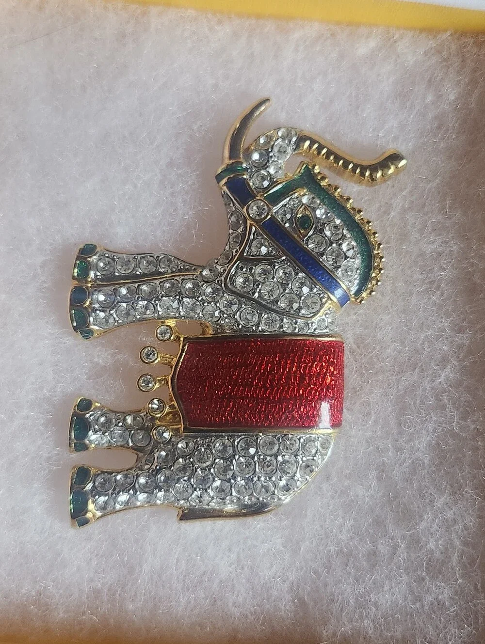 Sparkling Crystal Elephant Brooch with Red Enamel Saddle